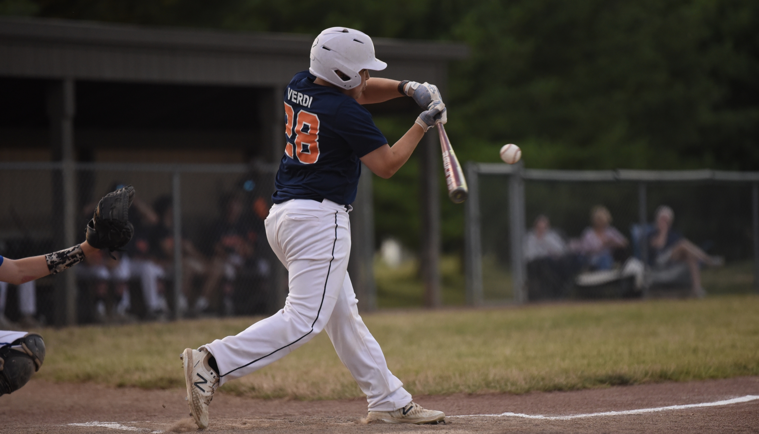 Baseball Player Hitting by CSA Images